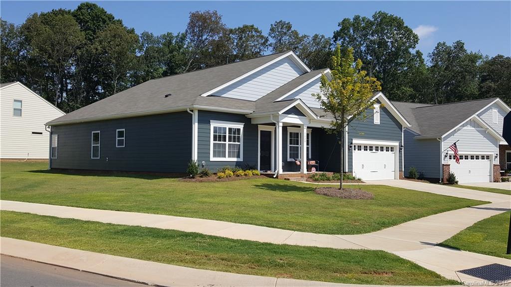 1628 Spring Blossom Trail, Unit SITE 18 Fort Mill, SC 29708 - Photo 3 of 22 a front view of a house with a yard
