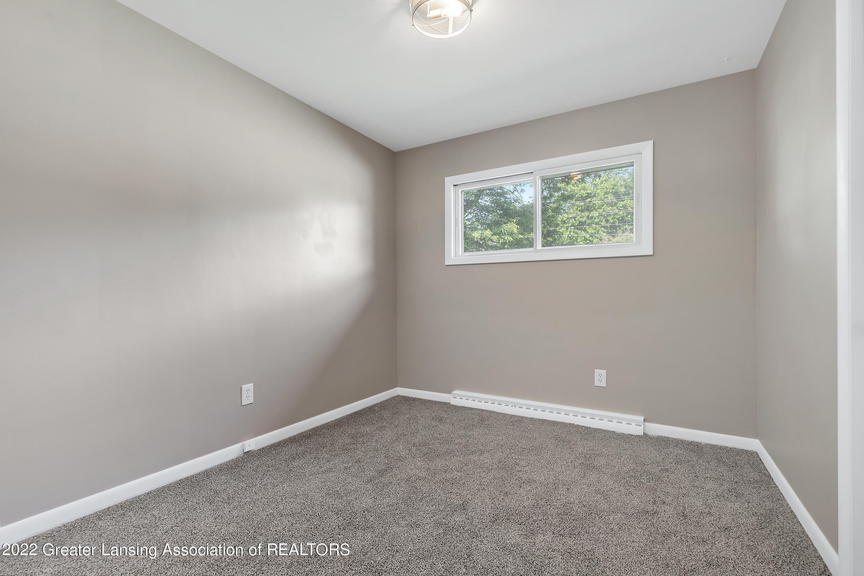 1130 North Creyts Road Lansing, MI 48917 - Photo 22 of 37 25-1130-n-creyts-rd-WindowStill-Real-Est