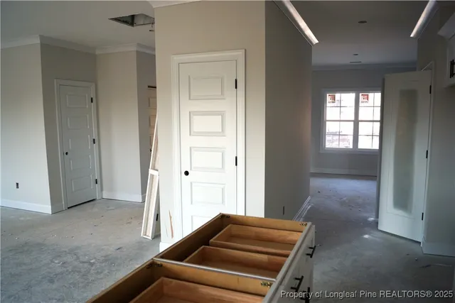 a room with a bed and a window