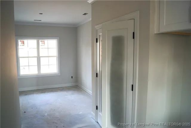 an empty room that has a window