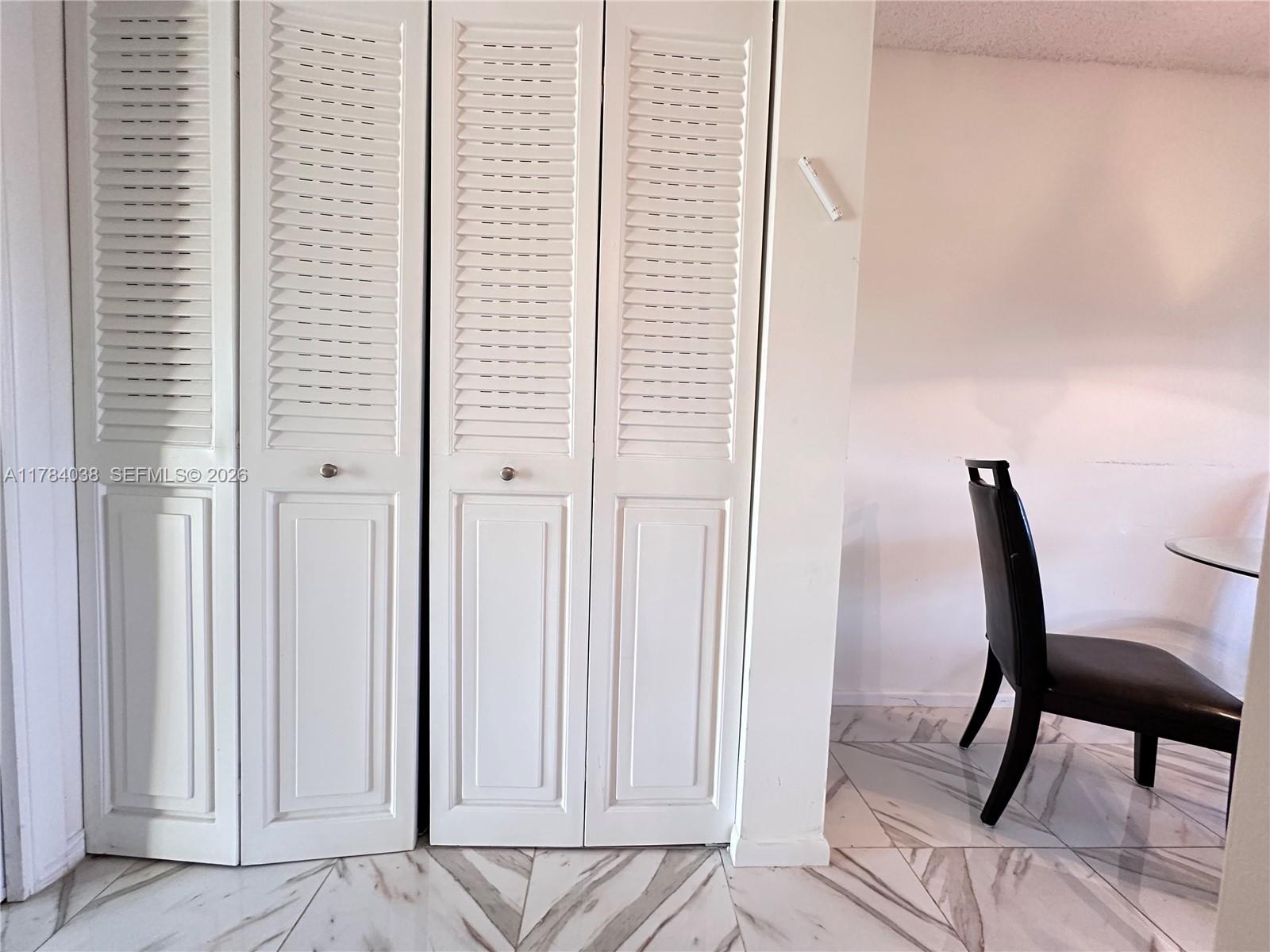 569 Fanshaw North, Unit 569 Boca Raton, FL 33434 - Photo 13 of 22 a view of a room with a furniture