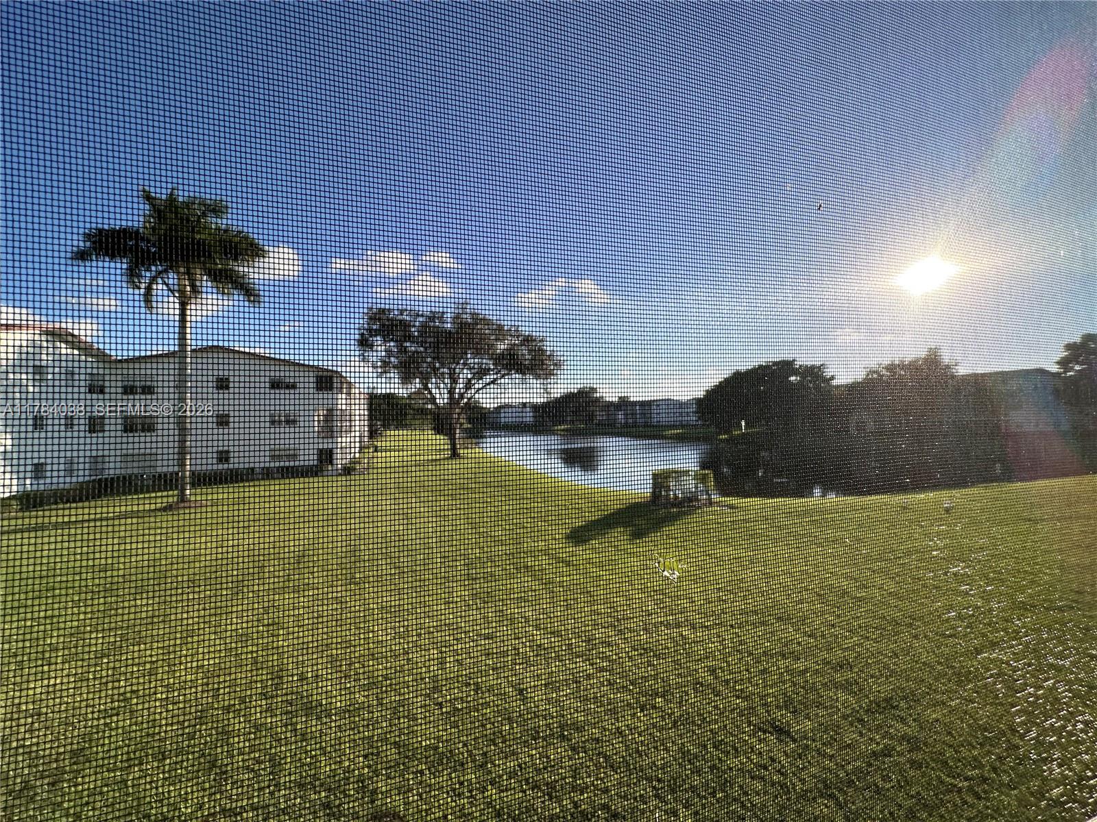 569 Fanshaw North, Unit 569 Boca Raton, FL 33434 - Photo 22 of 22 a view of a lake
