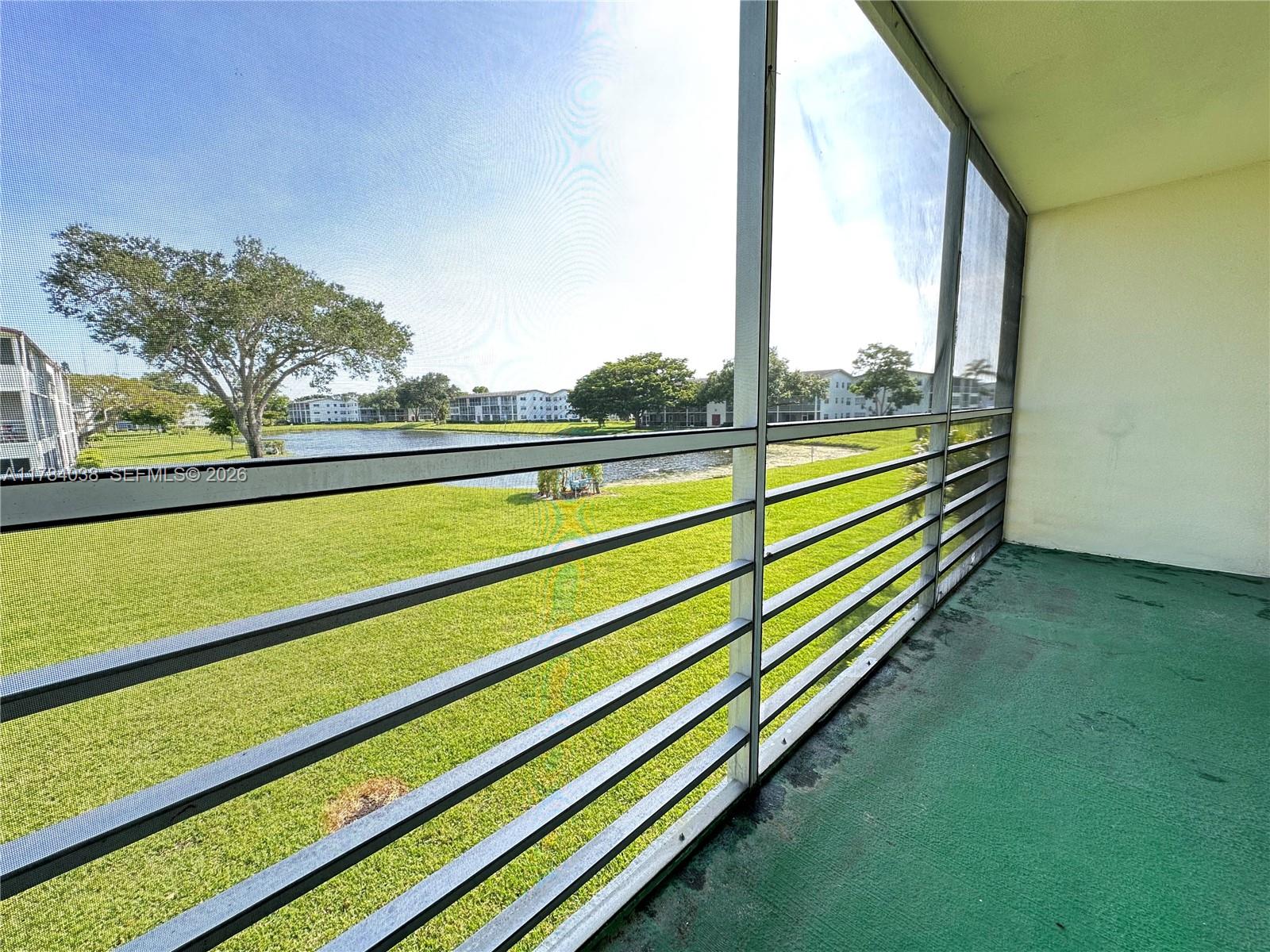 569 Fanshaw North, Unit 569 Boca Raton, FL 33434 - Photo 5 of 22 a view of outdoor space and city view