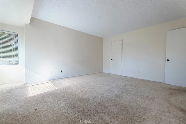 an empty room with an entryway
