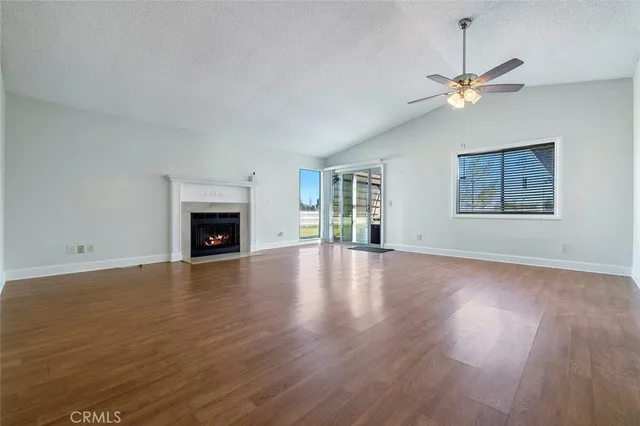 a kitchen with a stove sink and microwave
