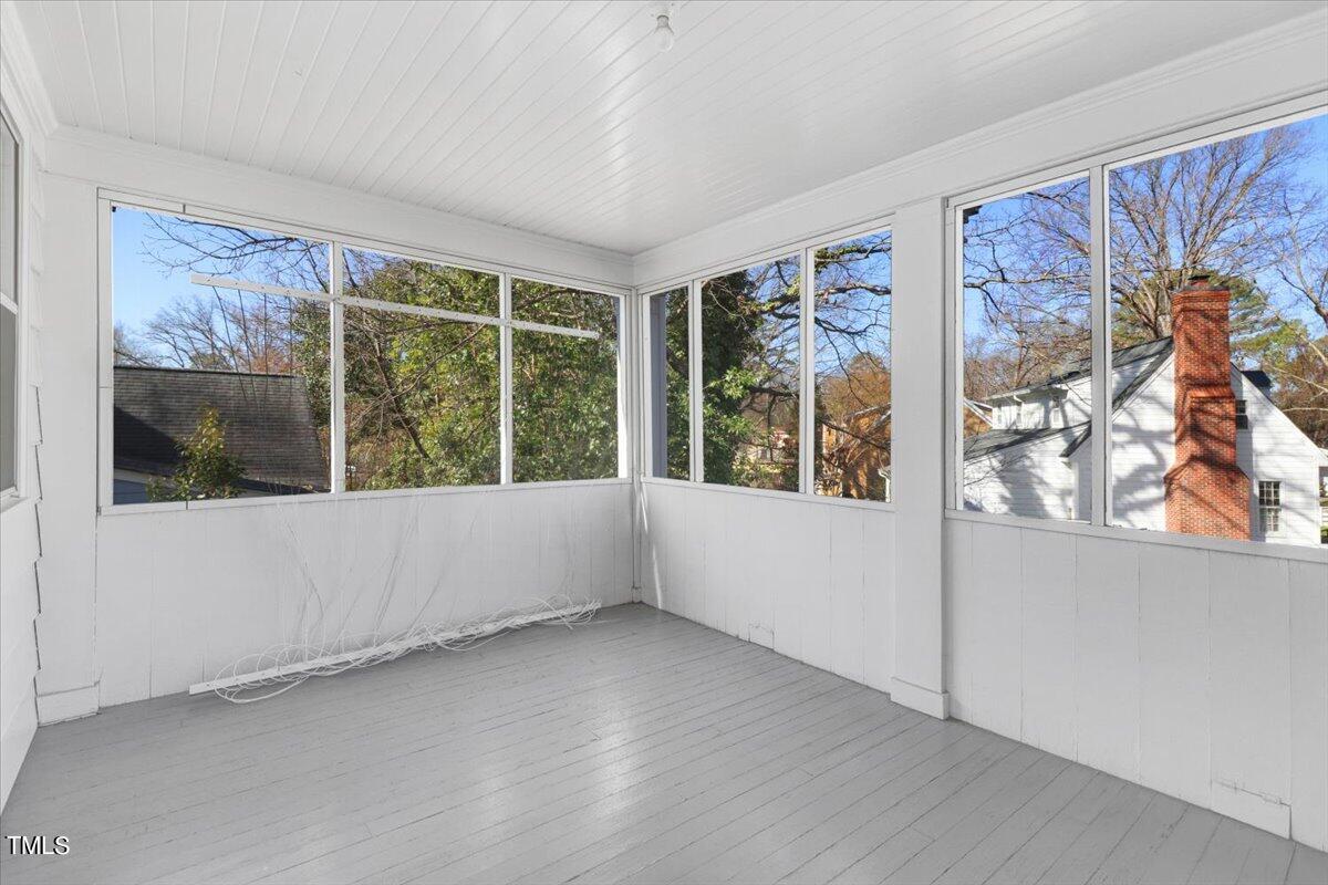 1015 Brooks Avenue Raleigh, NC 27607 - Photo 24 of 58 Private Screened Porch off of Primary Bedroom