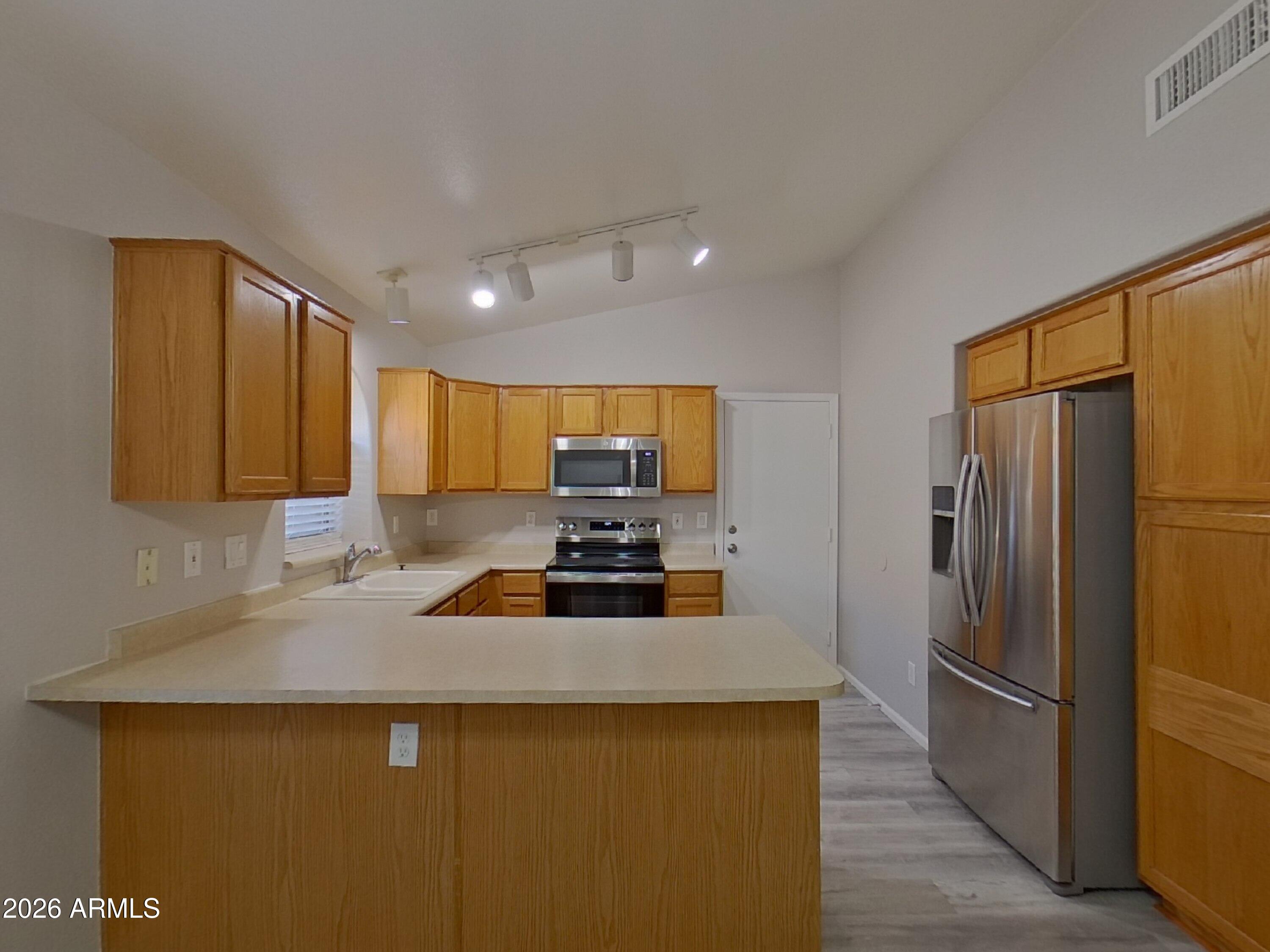 21854 North Braden Road Maricopa, AZ 85138 - Photo 5 of 16 4_pc_G2q5VH0ChG_6BBjh1BzX3_other_room_8B