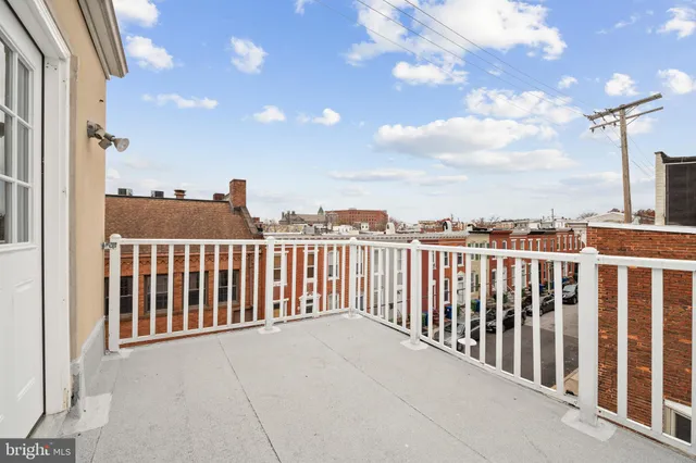 a view of a balcony with city view