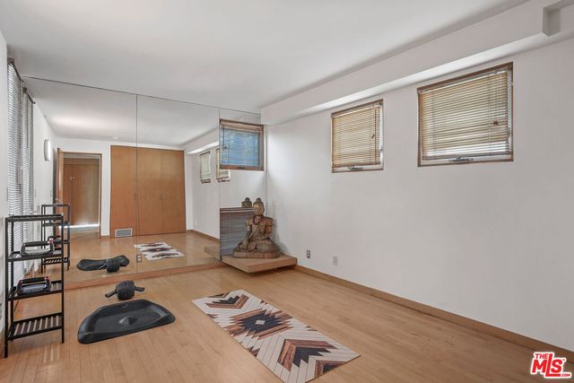 a view of a workspace with furniture