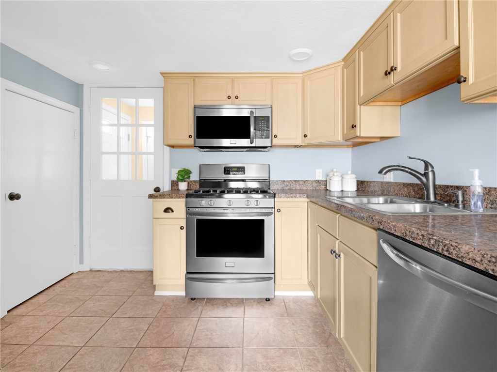 26 Anthony Street Warwick, RI 02886 - Photo 16 of 37 Kitchen with door to laundry room