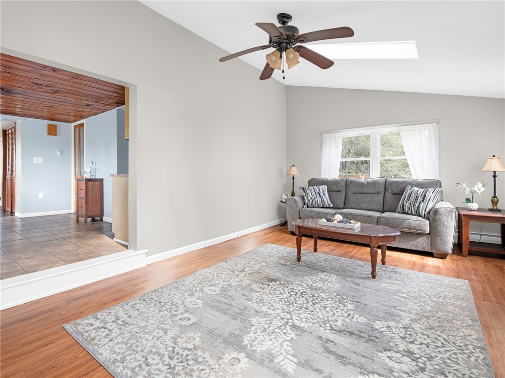 26 Anthony Street Warwick, RI 02886 - Photo 20 of 37 Family room with vaulted ceilings and skylights