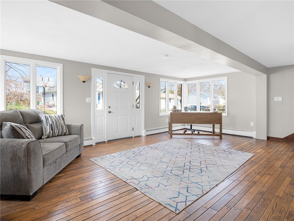 26 Anthony Street Warwick, RI 02886 - Photo 6 of 37 Front entry into living room with beautiful hardwood floors