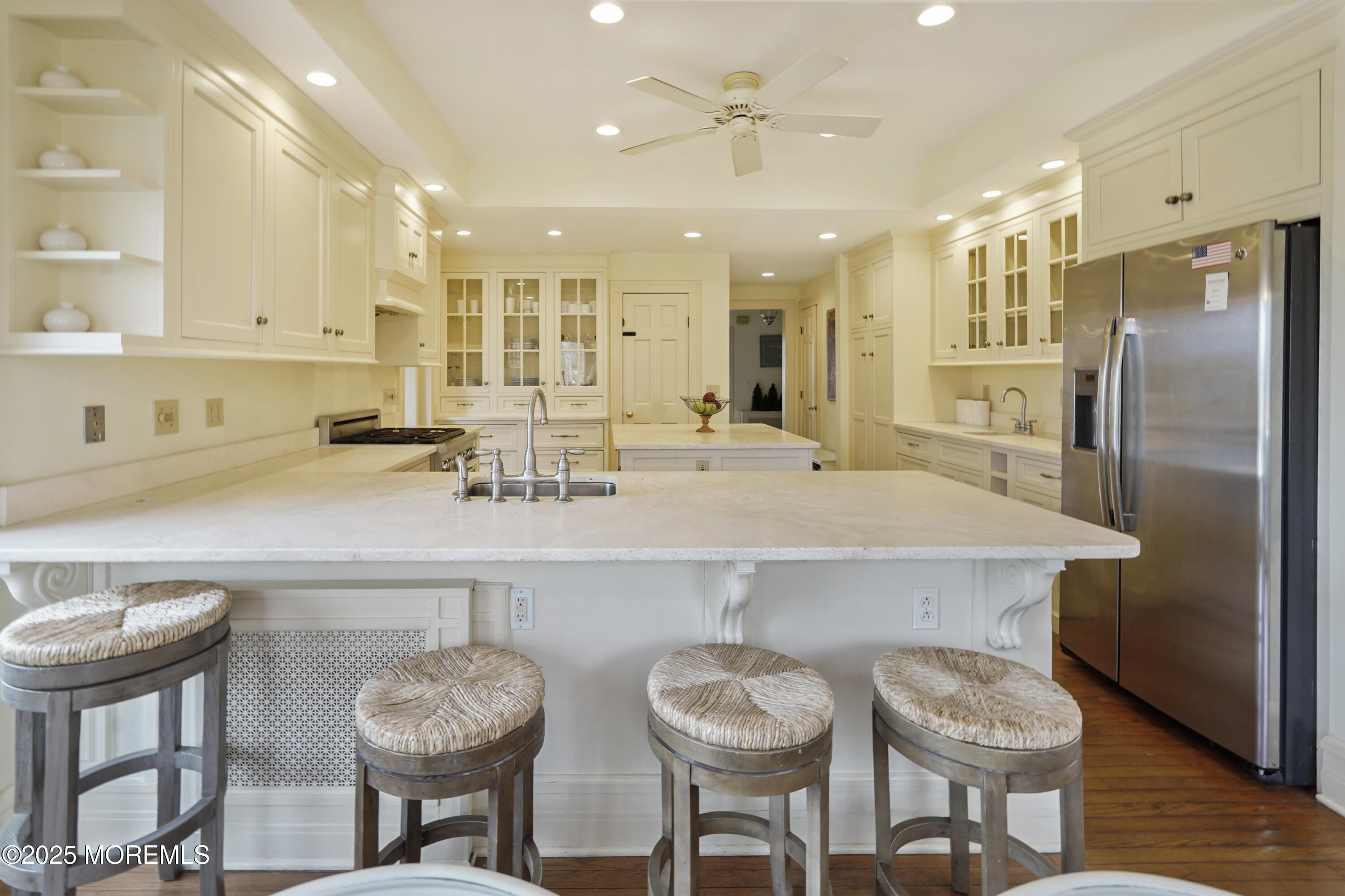 43 Rumson Road Rumson, NJ 07760 - Photo 14 of 28 a kitchen with stainless steel appliances a sink and a refrigerator