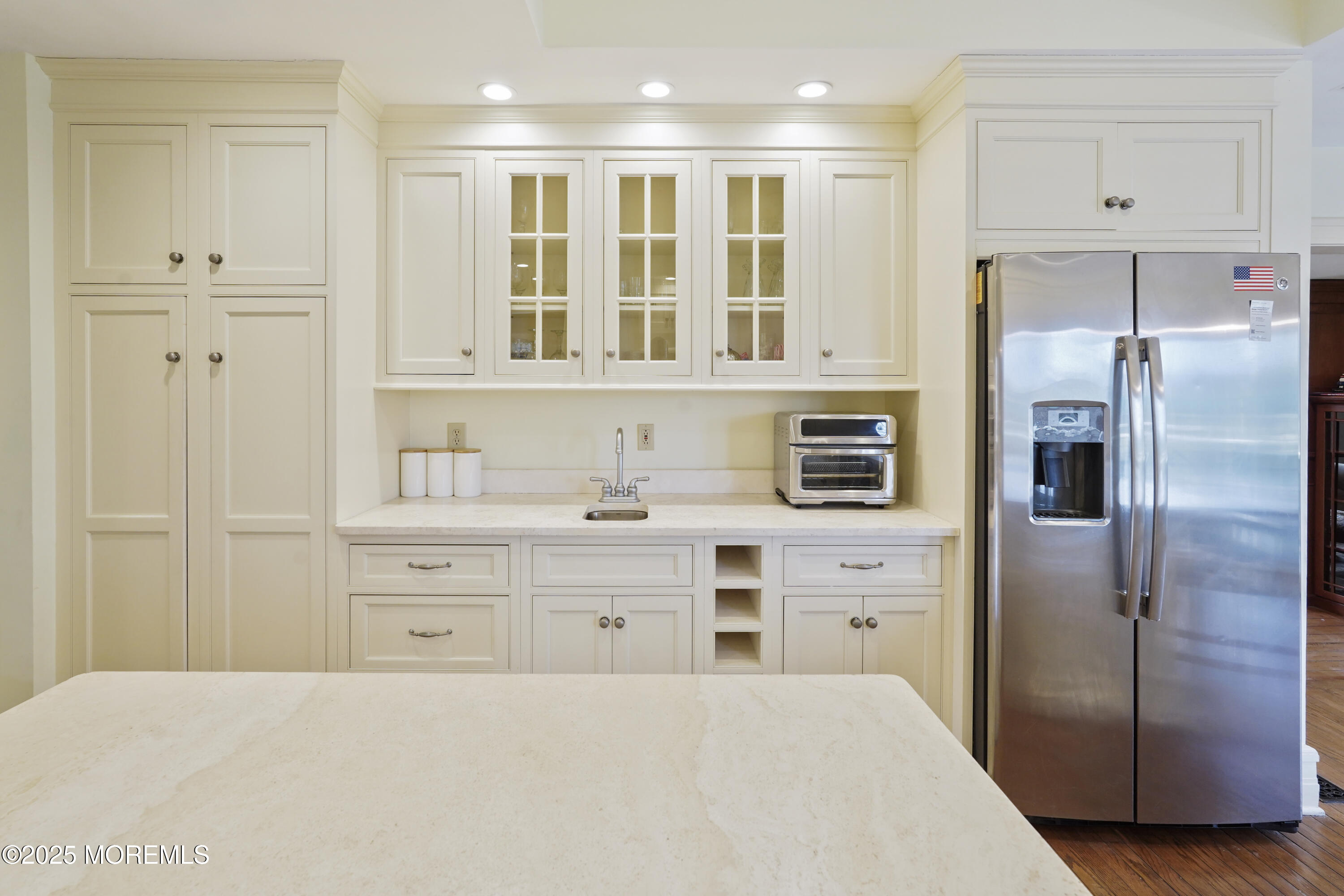 43 Rumson Road Rumson, NJ 07760 - Photo 16 of 28 a kitchen with a refrigerator and a sink