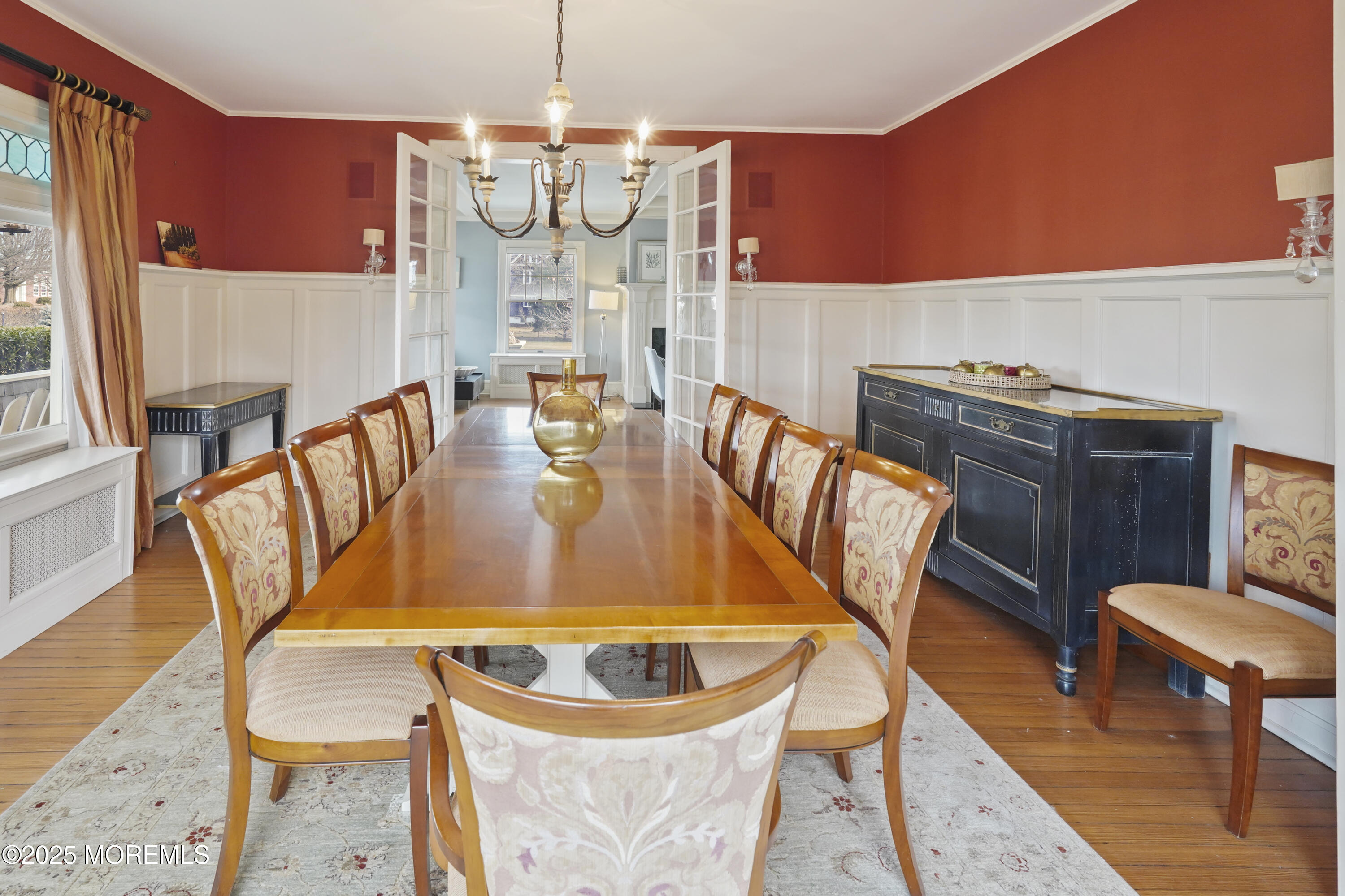 43 Rumson Road Rumson, NJ 07760 - Photo 17 of 28 a view of a dining room with furniture a chandelier and wooden floor