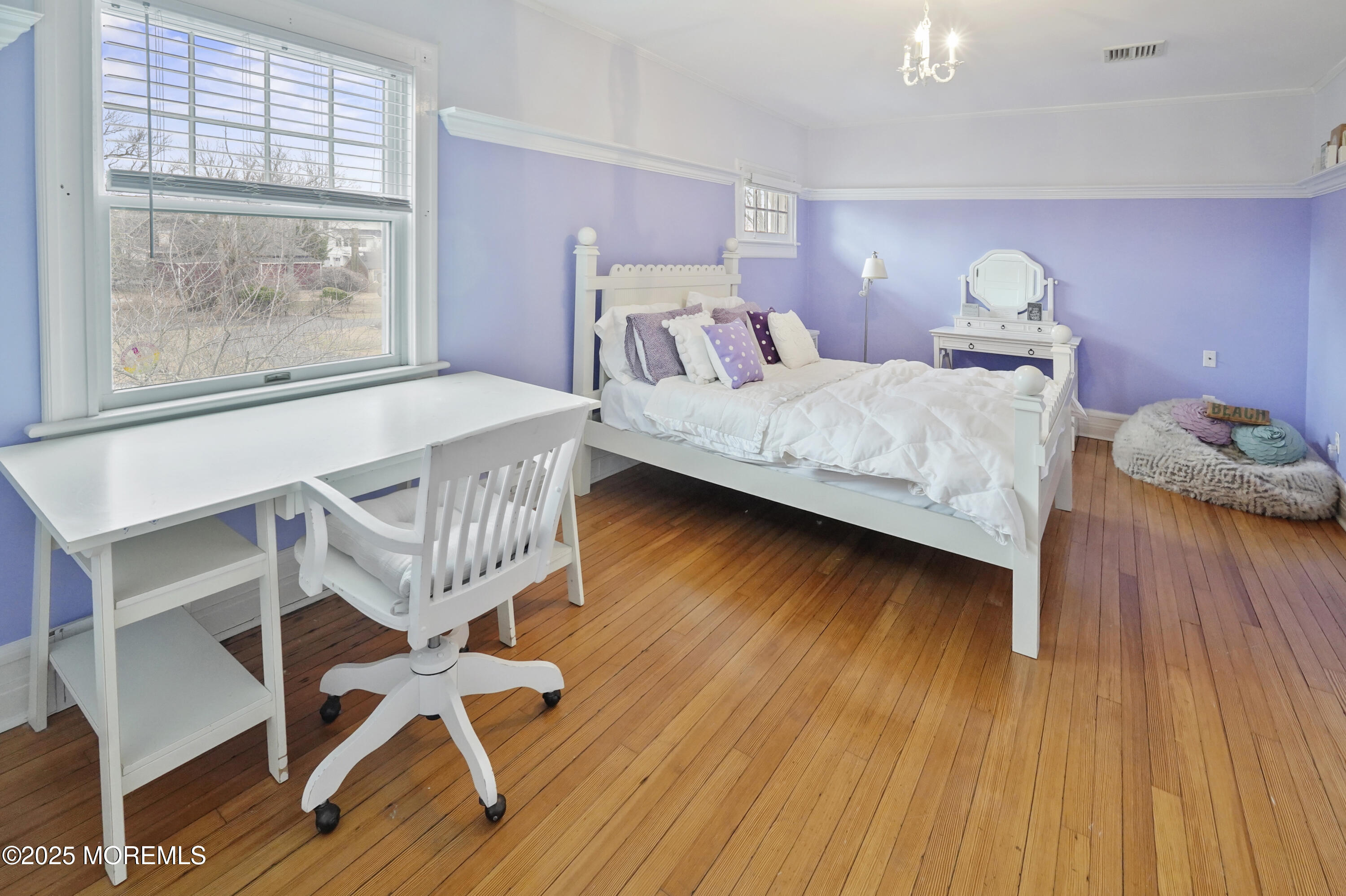 43 Rumson Road Rumson, NJ 07760 - Photo 20 of 28 a bedroom with a bed and wooden floor