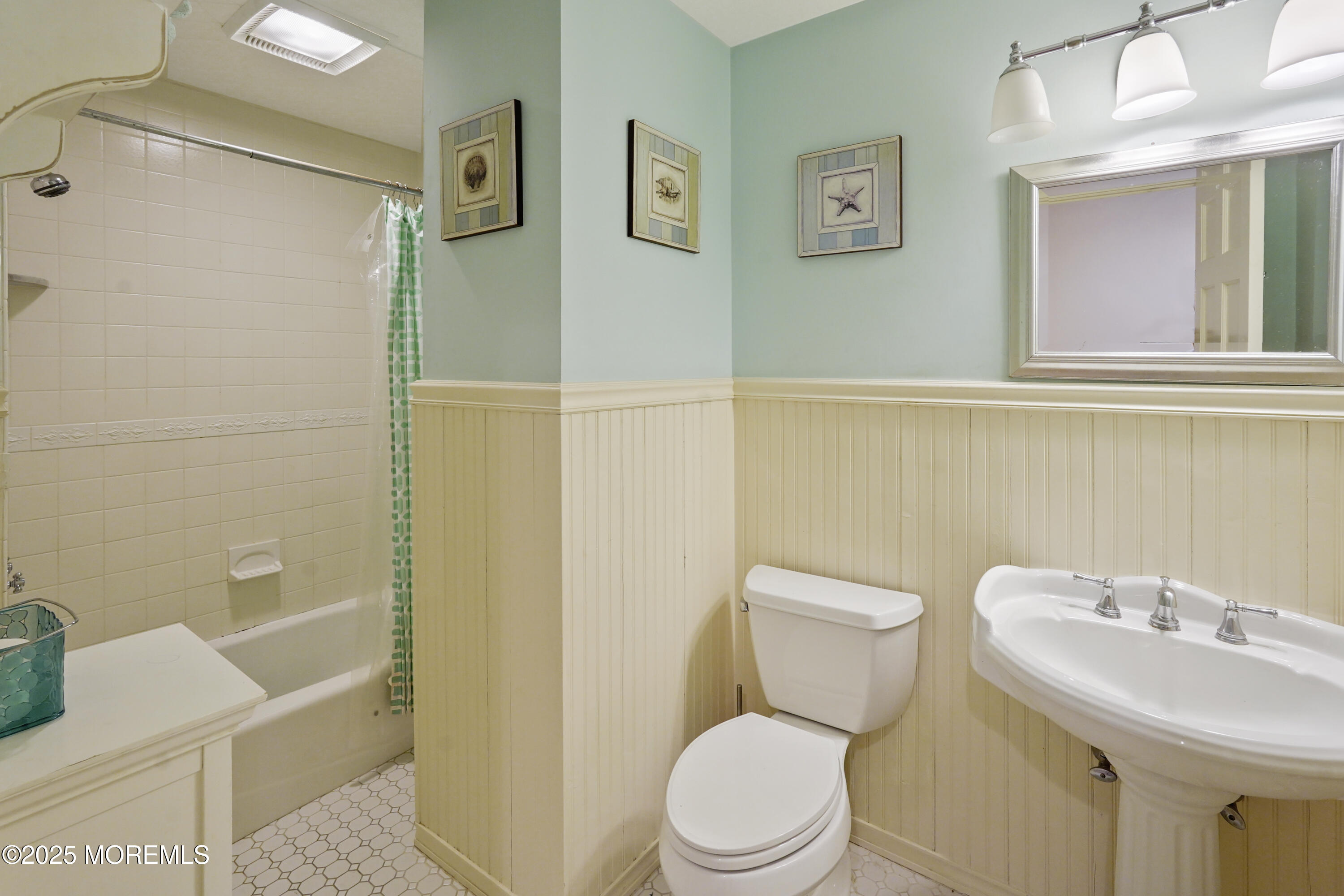 43 Rumson Road Rumson, NJ 07760 - Photo 25 of 28 a white toilet sitting next to a bathroom sink