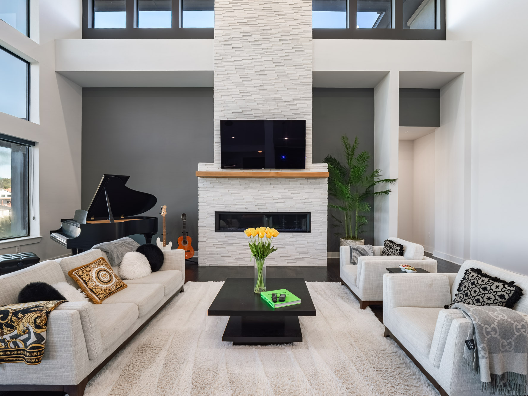 14900 Copper Ridge Lane Austin, TX 78734 - Photo 8 of 39 Living room featuring a high ceiling and a stone fireplace