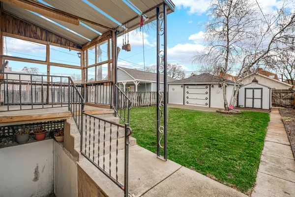 a view of a porch with a yard