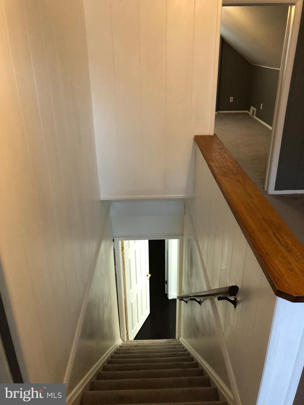 3512 Rhom Road Baltimore, MD 21207 - Photo 11 of 26 Entrance stairway to upper level