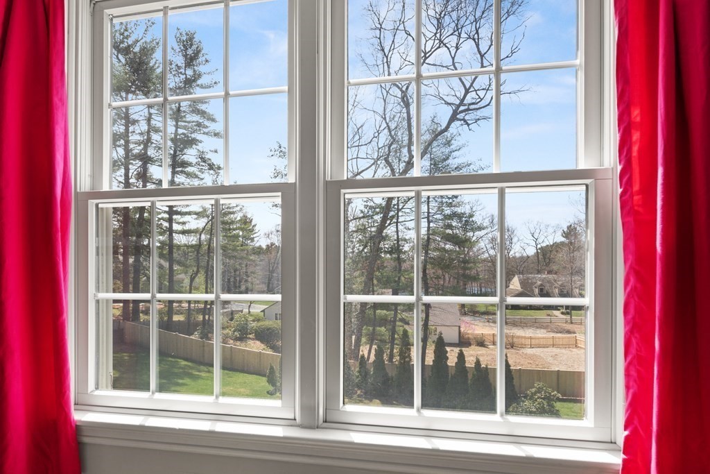 32 Howland Lane Hingham, MA 02043 - Photo 29 of 40 a view of a room with a large window and wooden floor