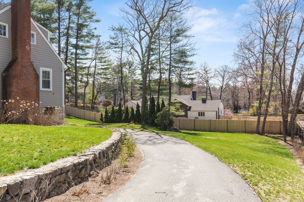 32 Howland Lane Hingham, MA 02043 - Photo 37 of 40 a front view of a house with a yard