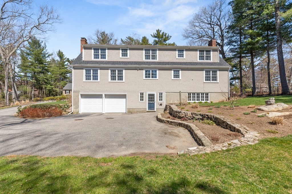 32 Howland Lane Hingham, MA 02043 - Photo 38 of 40 a front view of a house with a yard