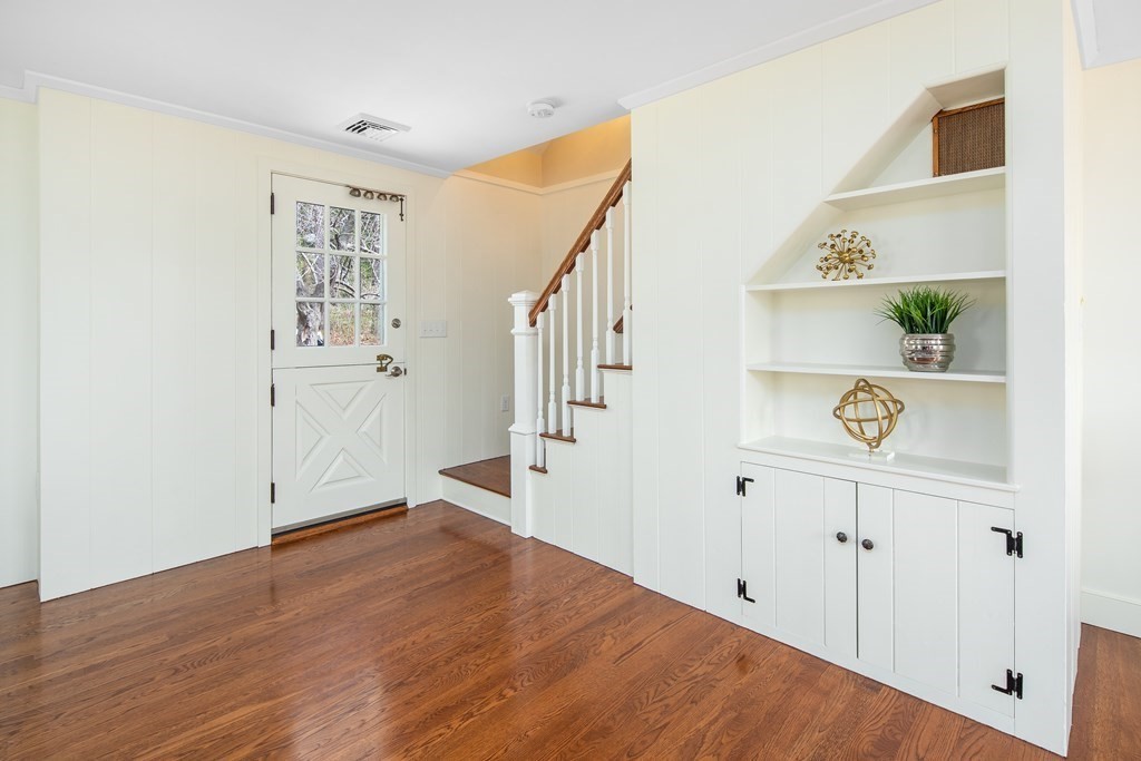 32 Howland Lane Hingham, MA 02043 - Photo 5 of 40 a view of an entryway with wooden floor