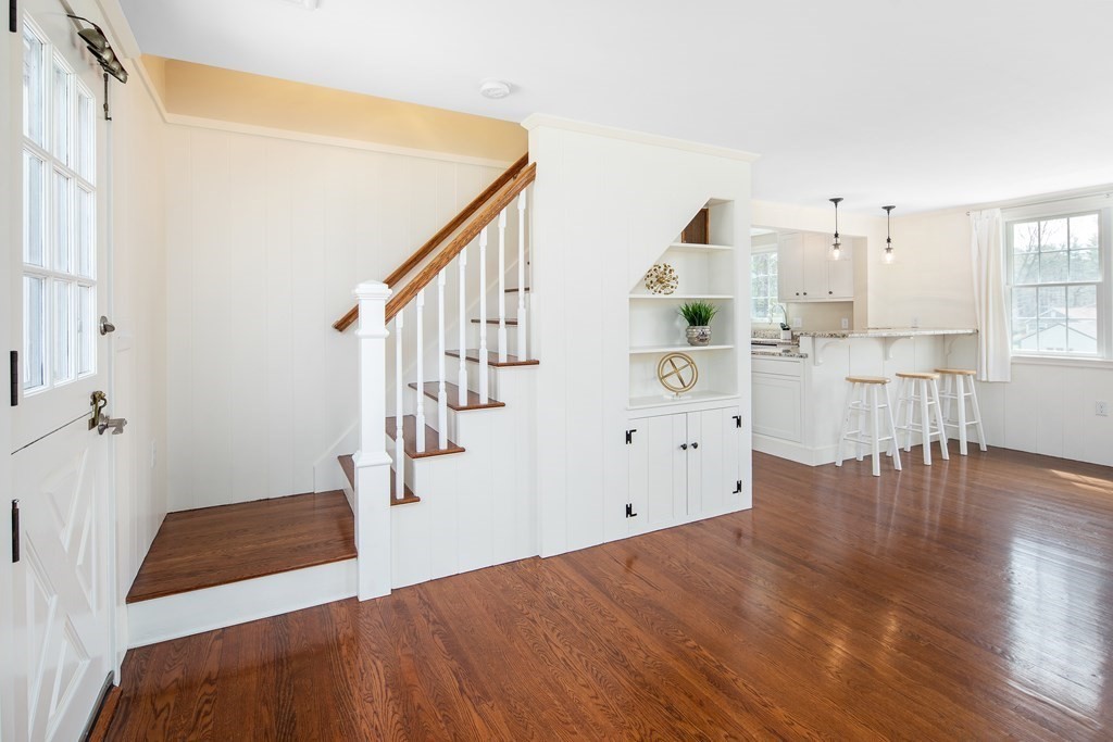 32 Howland Lane Hingham, MA 02043 - Photo 8 of 40 a bedroom with a bed and a view of living room