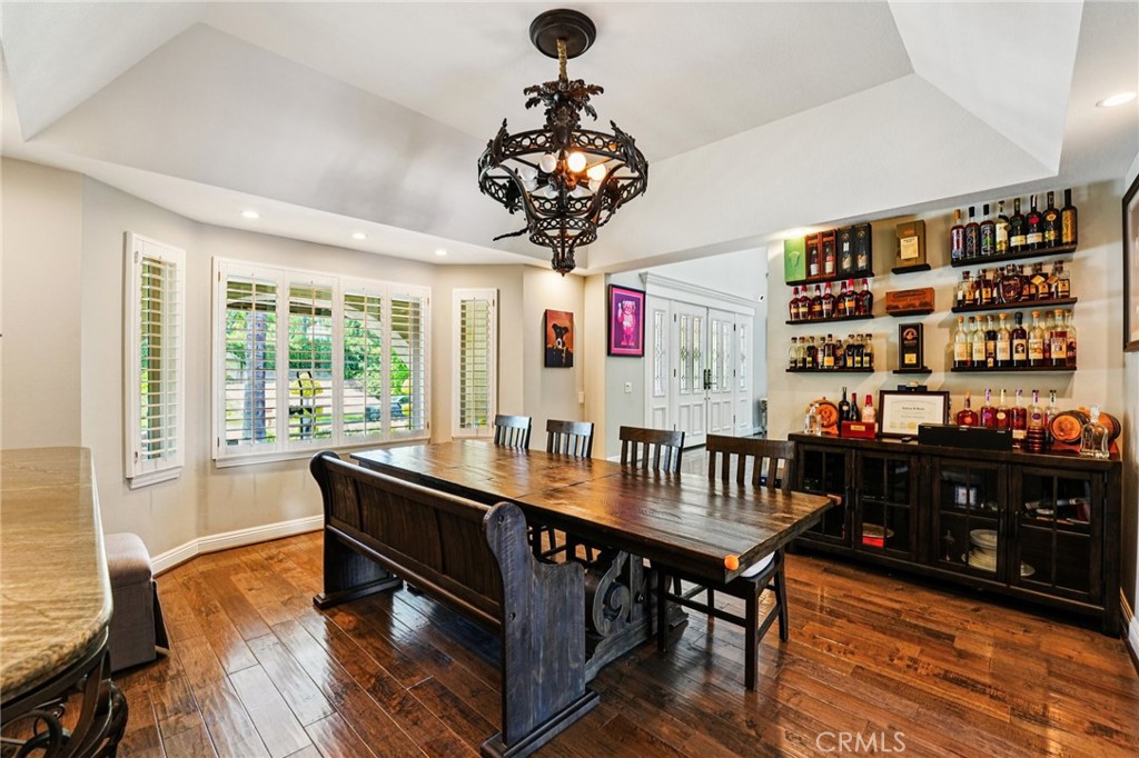 1623 Northhampton Drive Riverside, CA 92506 - Photo 20 of 59 a view of a dining room with furniture window and wooden floor