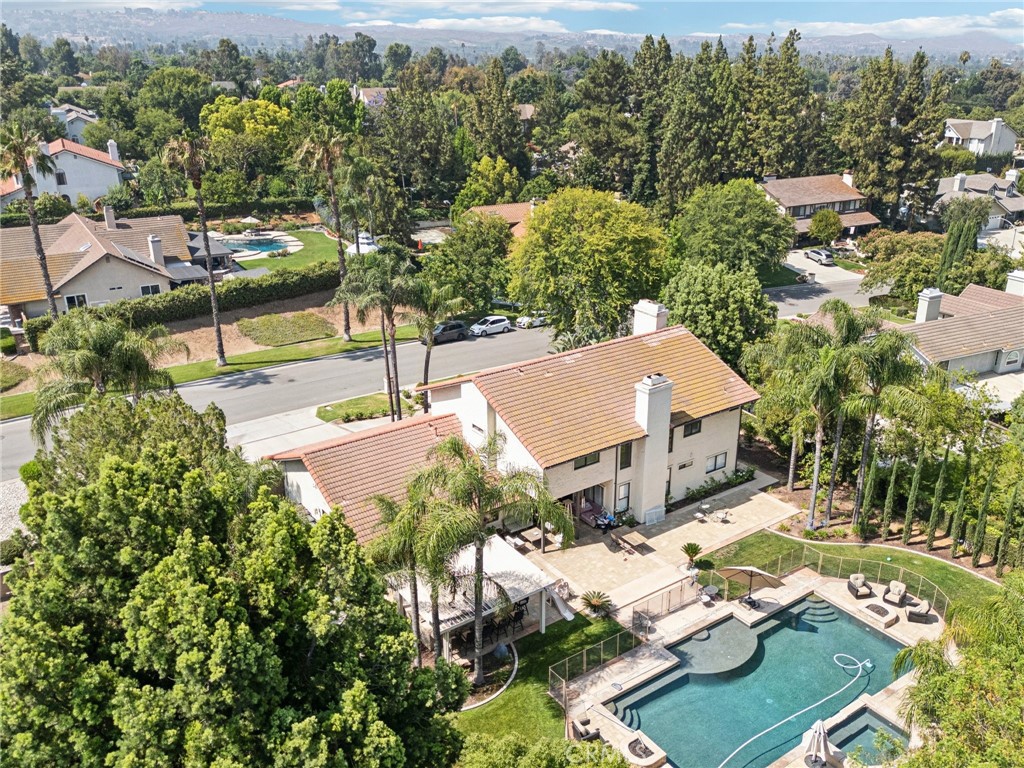 1623 Northhampton Drive Riverside, CA 92506 - Photo 3 of 59 an aerial view of a house with yard swimming pool and lake view