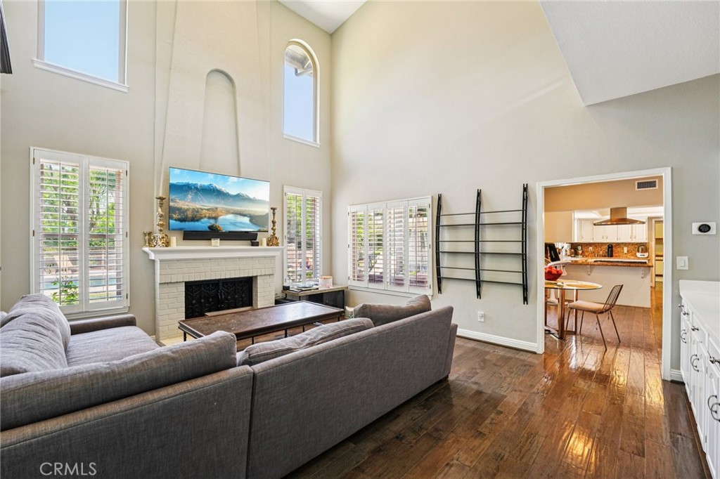 1623 Northhampton Drive Riverside, CA 92506 - Photo 5 of 59 a living room with furniture fireplace and flat screen tv