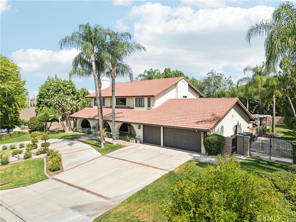 1623 Northhampton Drive Riverside, CA 92506 - Photo 53 of 59 a front view of a house with a yard