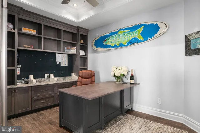 a view of a room with wooden floor and staircase
