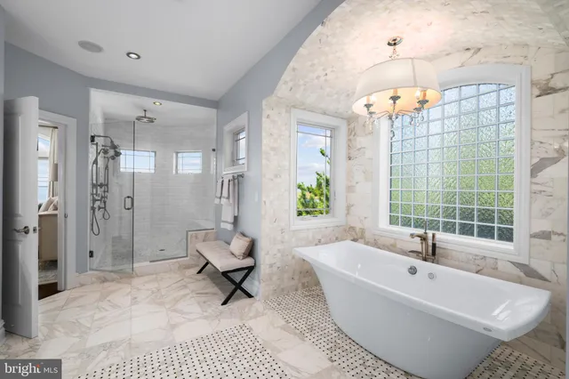 a bedroom with a bed and a table in it