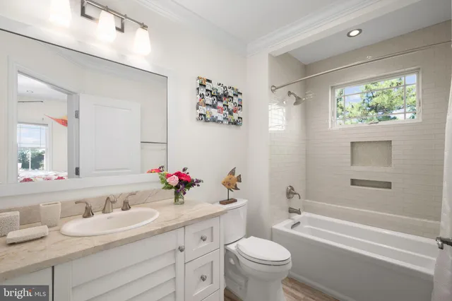 a view of a lake with wooden bridge