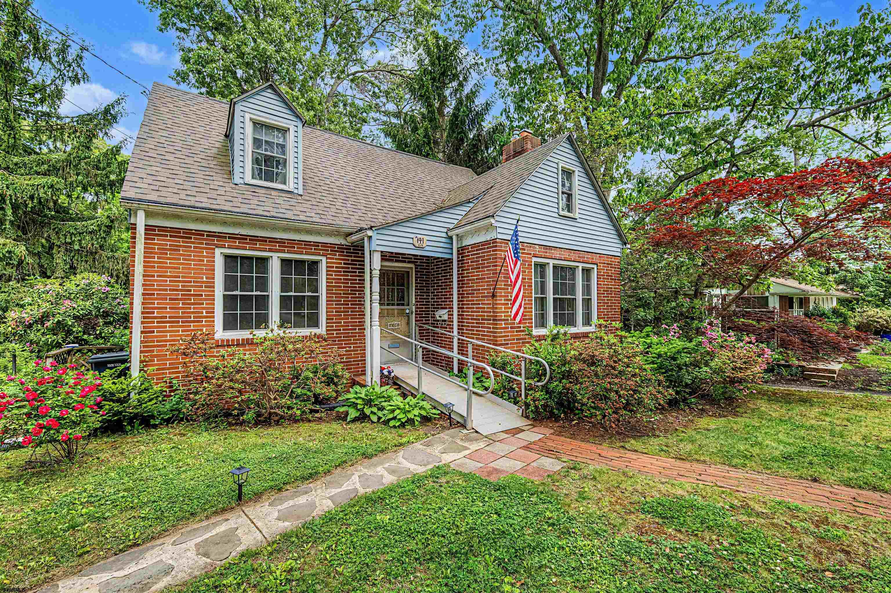 144 Pitney Road Absecon, NJ 08201 - Photo 43 of 47 a front view of a house with garden