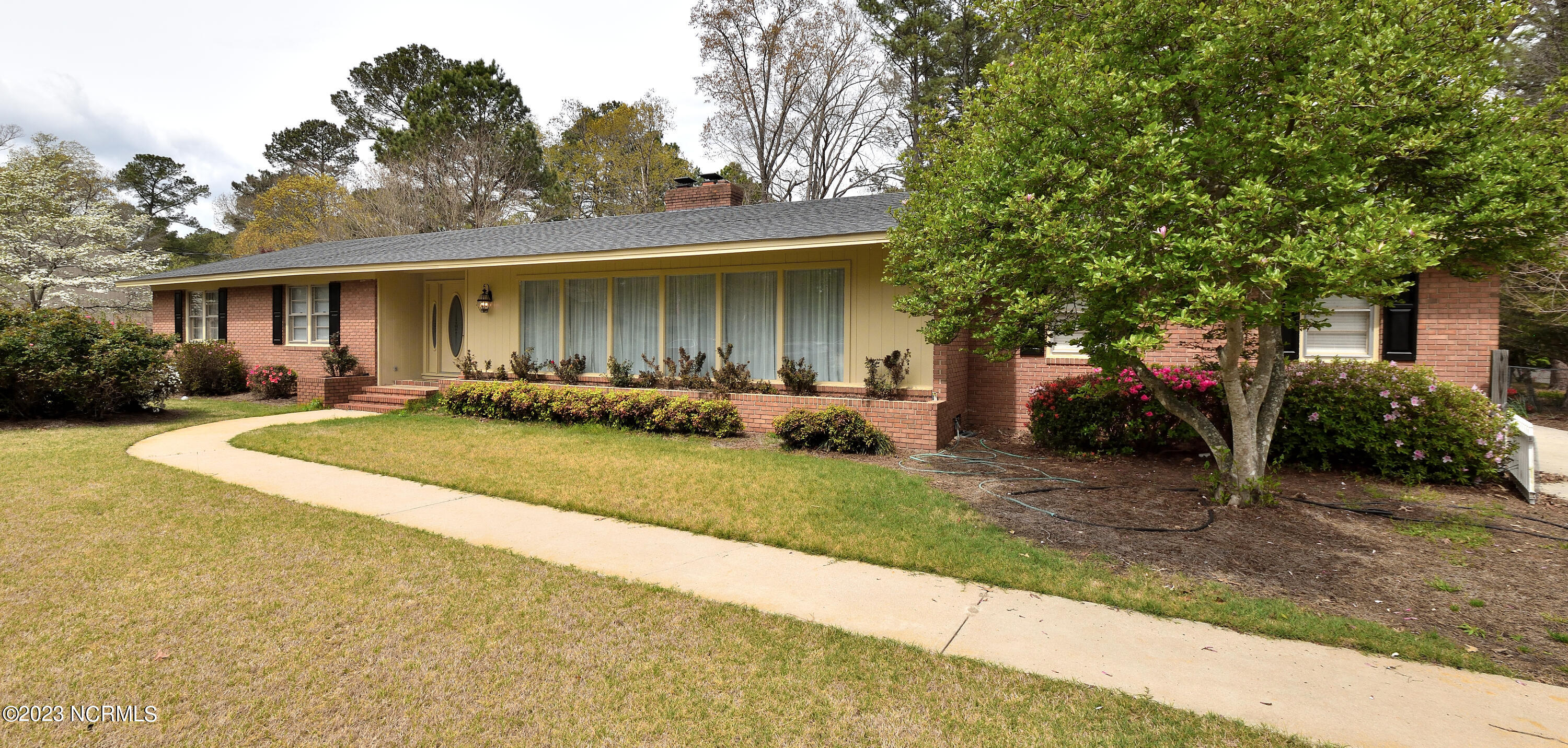 4004 Hawthorne Road Rocky Mount, NC 27804 - Photo 4 of 39 Concrete walkway