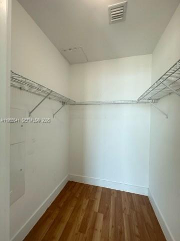55 Southeast 6th Street, Unit 4100 Miami, FL 33131 - Photo 6 of 10 a view of a room with racks on the wall