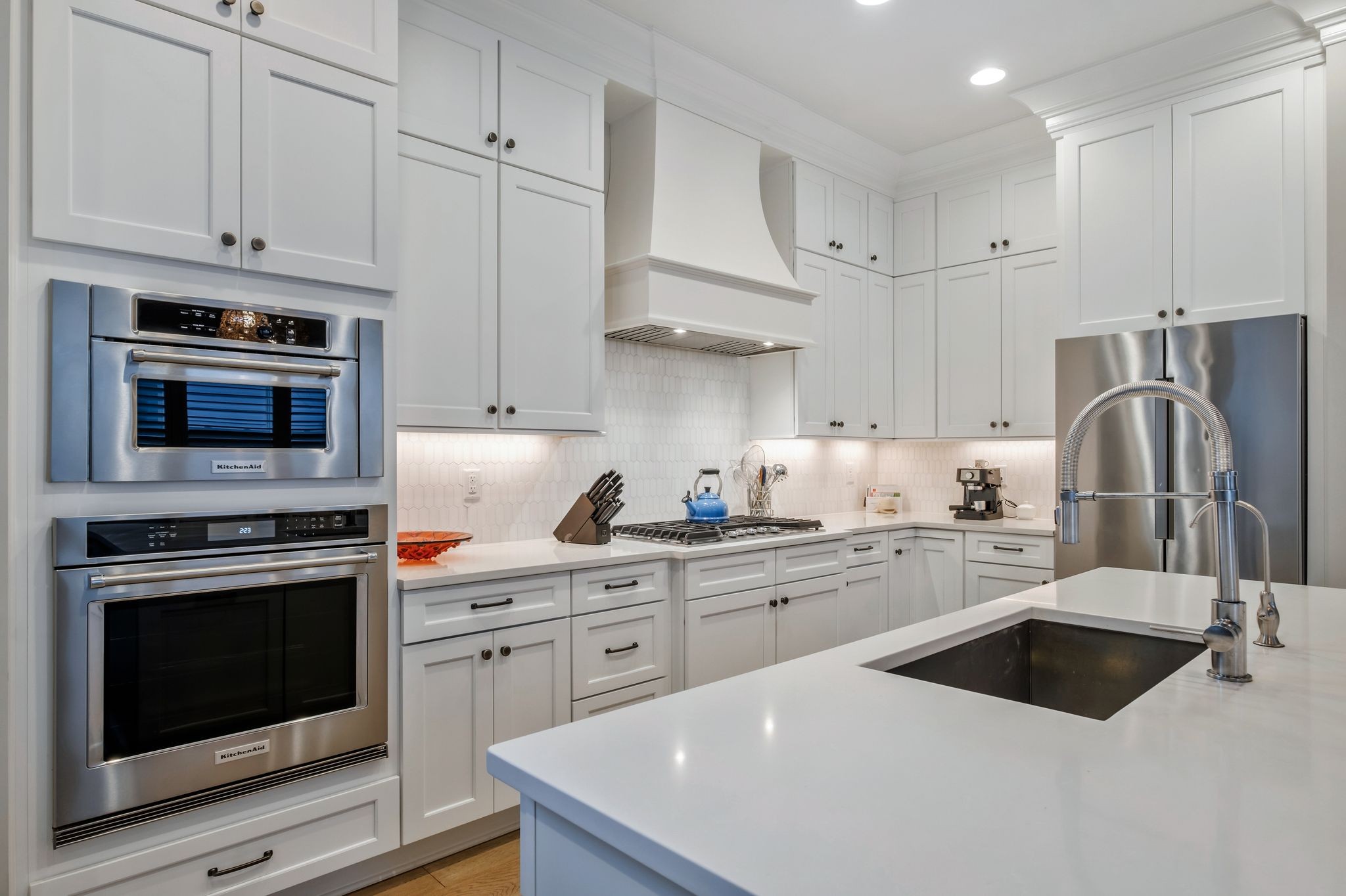 3049 Long Branch Circle Franklin, TN 37064 - Photo 13 of 30 a kitchen with cabinets a sink and stainless steel appliances