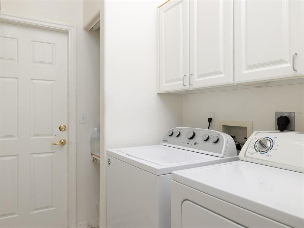 6635 Southwest 113th Place Ocala, FL 34476 - Photo 25 of 43 a utility room with dryer and washer
