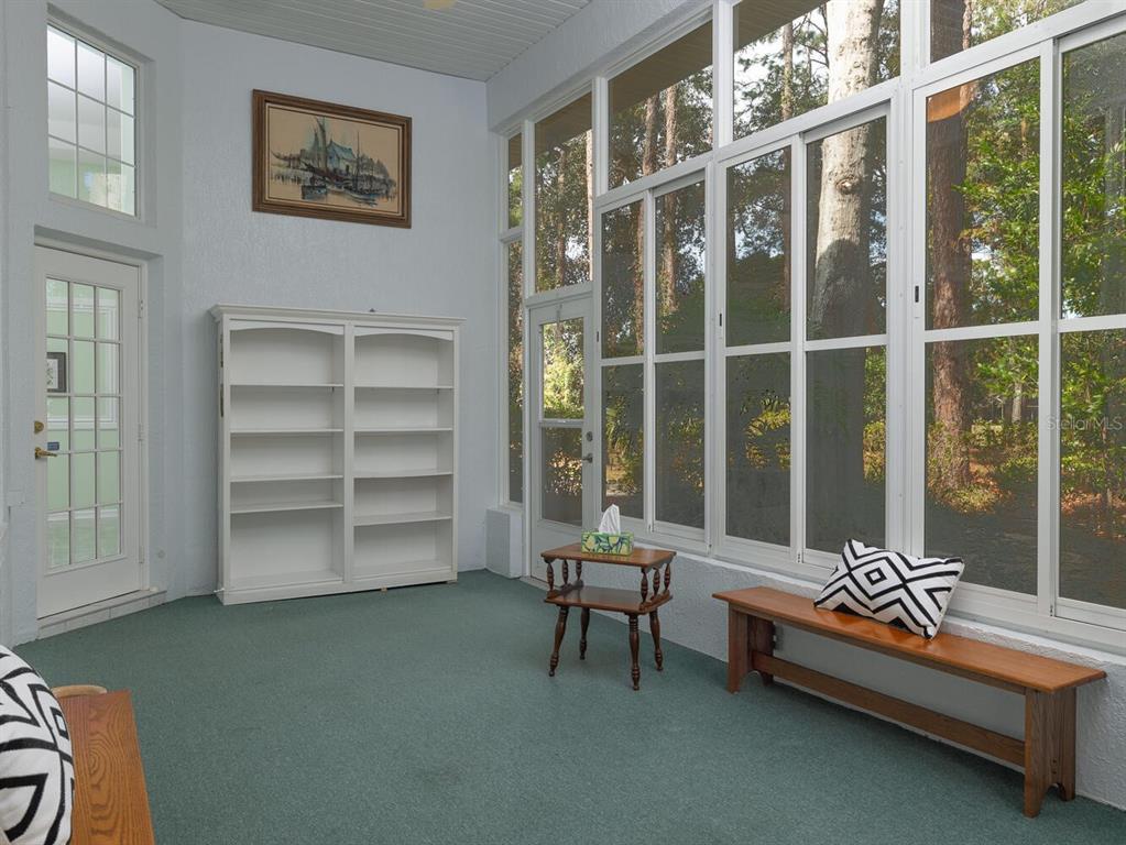 6635 Southwest 113th Place Ocala, FL 34476 - Photo 27 of 43 a bedroom with furniture and a window