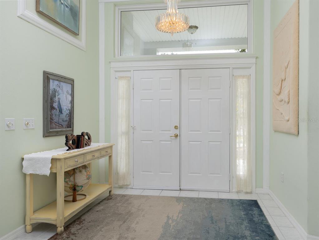 6635 Southwest 113th Place Ocala, FL 34476 - Photo 4 of 43 a bathroom with a sink a vanity and a mirror