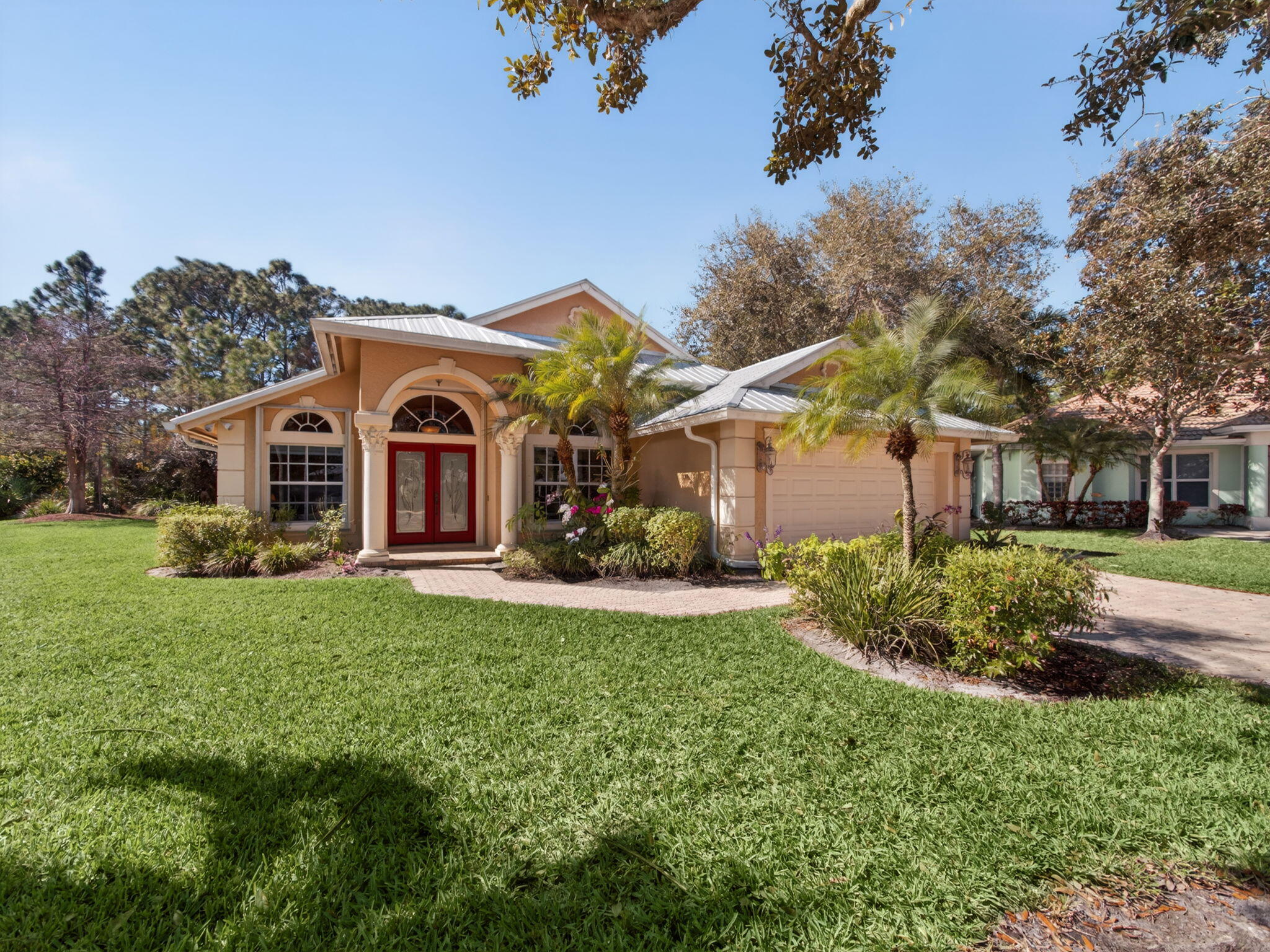 8388 Southwest Masthead Drive Stuart, FL 34997 - Photo 1 of 35 Front of the House