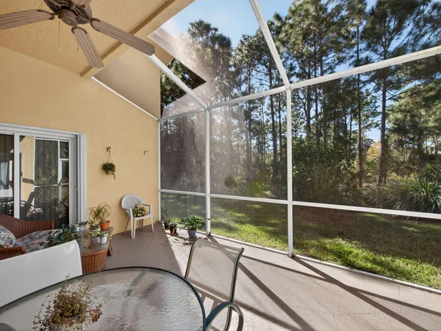 a view of balcony with furniture