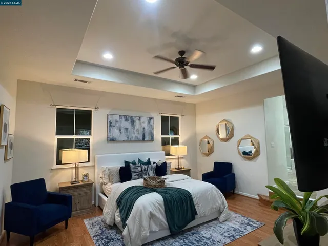 a bed room with a bed and a couch