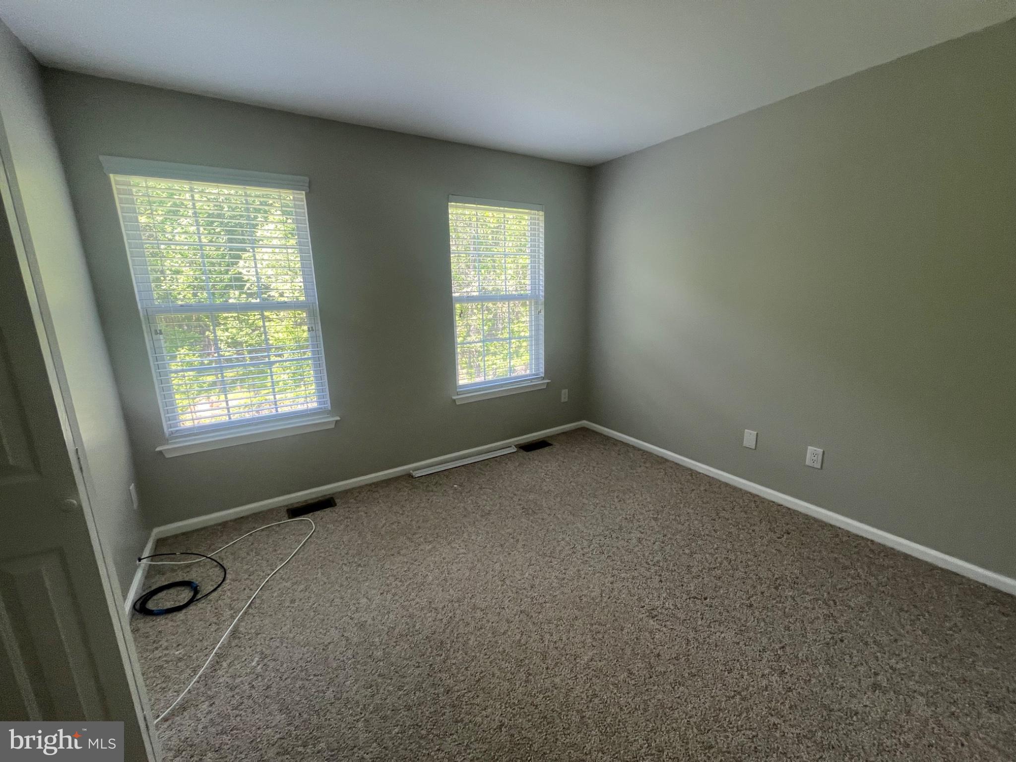 2003 Stokes Road Mount Laurel, NJ 08054 - Photo 5 of 7 an empty room with windows