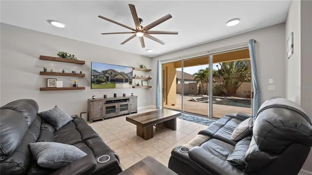 a kitchen with stainless steel appliances granite countertop a refrigerator stove and oven