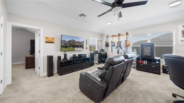 a view of swimming pool with a patio