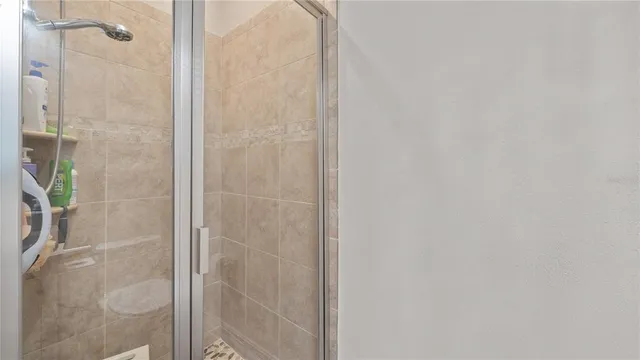 a view of a livingroom with furniture and a window